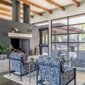 Access to resident-only features a living room with a fireplace