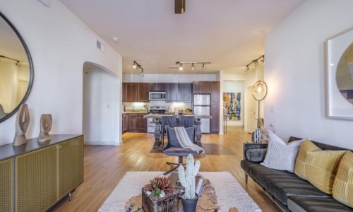 a living room with a couch and a table