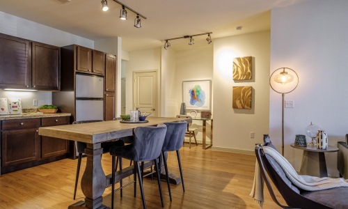 a kitchen with a dining table