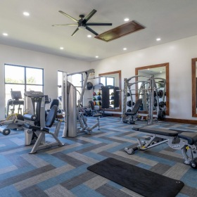 Cutting-edge amenities at your fingertips a gym with exercise equipment