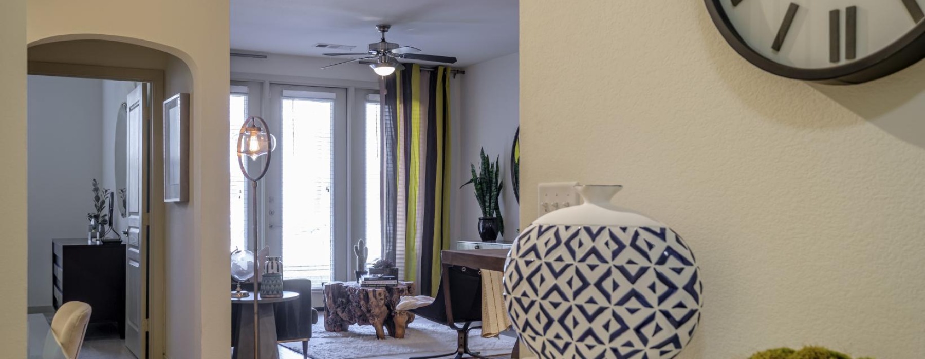 a living room with a large clock